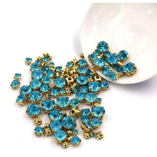 Hot sale 100pcs/bag Mixed size glass strass crystal beads gold base sewing Lake blue rhinestones diy Wedding decoration