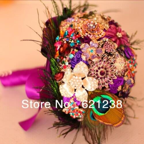 Holding purple flower brooch for Purple Wedding Jewelry & peacock feathers creative bouquets, bride holding flowers