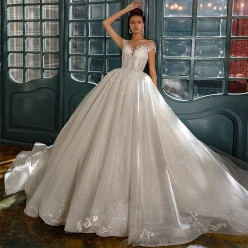 Gorgeous Ball Gown Wedding Dresses Plus Size Vestido Casamento O-Neck Backless See Through Shiny Bride Gowns