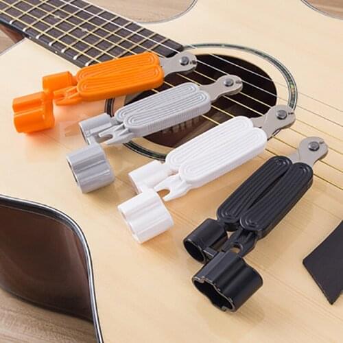 Electric acoustic guitar winder take string nails pull string cone shears string winder multi-function string changing gadget