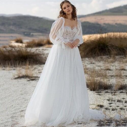 Fairy Boho Wedding Dresses 2021 Lace Vintage Bride Dress Puff Long Sleeve Beads Bohemian Wedding Gowns Beach Robe de Mariage