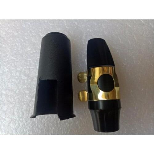 Soprano mouthpiece has ligation and hat and reed