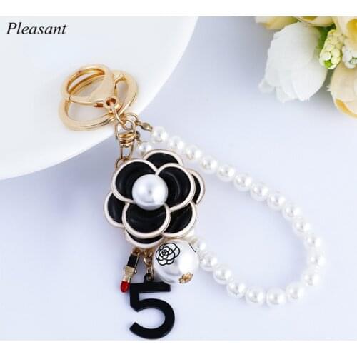 2021 Creative New Dripping Camellia Pearl Keychain Pendant Bag Keychain Pendant Small Jewelry Gift Accessories Wholesale