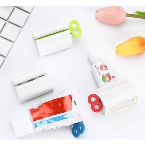 Toothpaste Dispenser Tube Squeezer Tooth Paste Squeezer Facial Cleanser ABS Rolling Toothpaste Seat Holder Bathroom Accessories