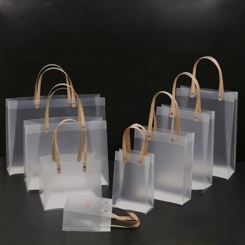 10Pcs/Lot High-quality Semitransparent Plastic Bag Frosted PP Bags With Paper Handle Hard Plastic Package Gift Candy Advertising