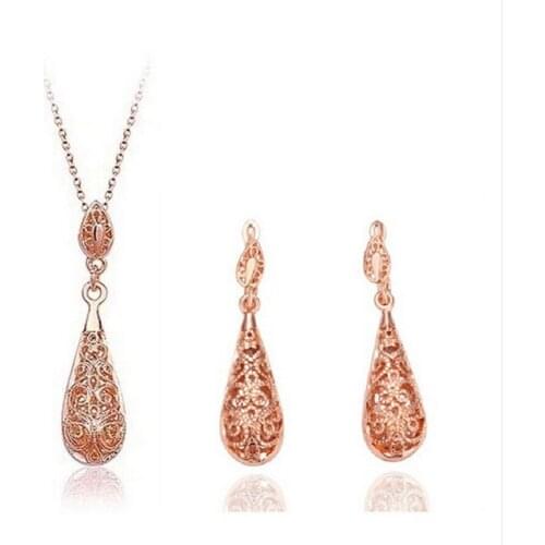 Fashion Hollow out figure gold-color water drop pendant cheap costume jewelry necklace and earrings vintage jewelry set