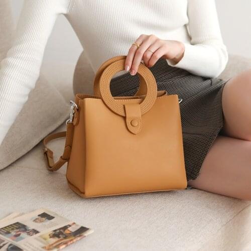 NMD 2021 summer fashion split leather soft female bag with car line ring soft hand carry womens solid color shoulder bag