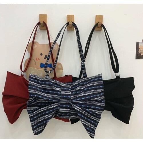 LHXCY 2021 New Messenger Bags Large Capacity Bowknot Canvas Bags Korean Version Japanese Student Small Solid Color Shoulder Bags