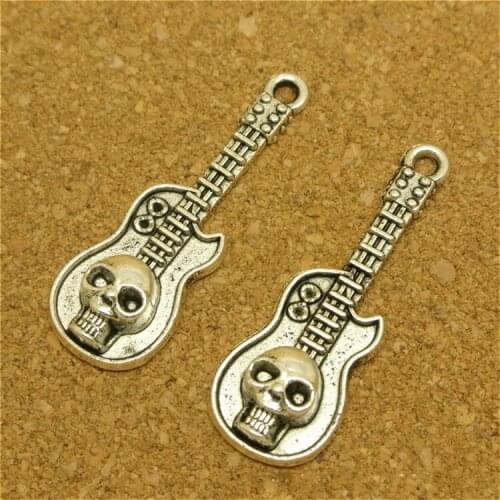High Quality 20 Pieces/Lot 32mm*11mm Antique Silver Plated Skulls Guitar Charms