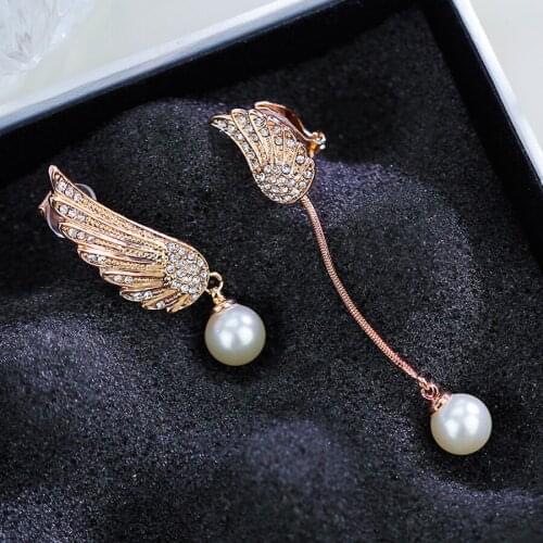 Fashion asymmetry wing design clip on jewelery earrings without hole ear for girls daily wearing wedding party jewellery gift