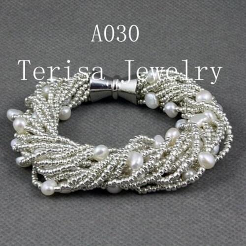 New Free Shipping A030, Grade AAA.Natural Fresh Water Pearls Size:6-7mm.16 String.Color:White color.Vogue Bracelet
