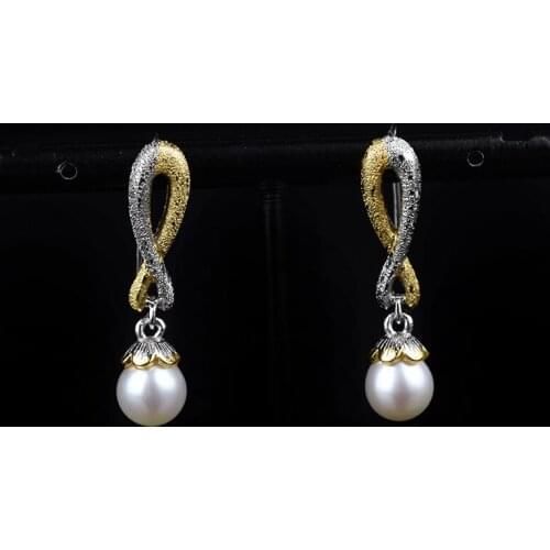 The new 925 silver 18K gold hand inlaid pearl frosting exquisite womens earring earrings