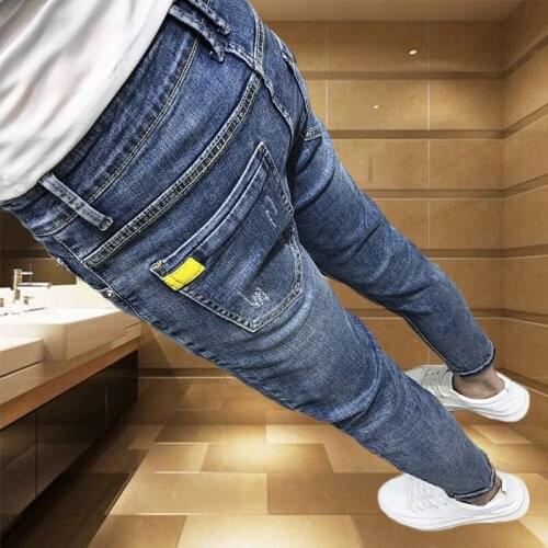 Elastic autumn 2021 mens denim Korean style slim feet trendy teenagers hair stylist pants street students all-match trousers