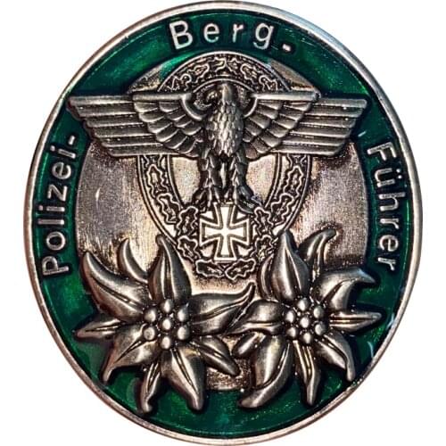 Germany - WWII Police Mountain Guide Badge Features the Eagle cross and oakleaf wreath on the front, above two edelweiss flowers