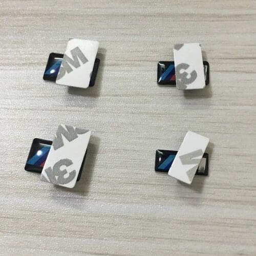 2X Car Glue Sticker for BMW M Logo E36 F20 E92 X5 E87 E30 E46 E91 F31 X5 E53 E34 F11 E70 X1 X3 F25 E53 G20 Decoration Emblem