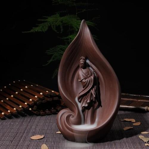 A blade of Guan Yin Buddha carved ceramic incense burners go back in creative Tower of sandalwood incense fragrance fragrant
