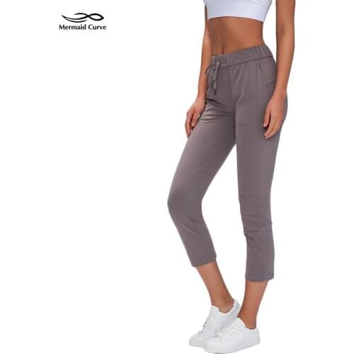 Womens Running Clothes Pants Ladies Yoga Loose Pants Capris On the Fly Crop 23" Yoga Pant Luxtreme Fabric On the Move Pants