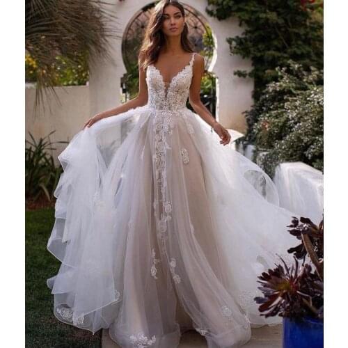 Wedding Dress 2021 A-Line V-Neck Spaghetti Straps Lace Appliques Beads Backless Tulle Sweep Train Bride Gown Vestidos De Noiva