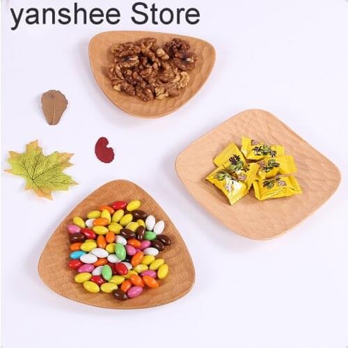 Natural hand carved wooden trays, shell designed storage, handmade plates, appetizers and nuts, restaurant tableware