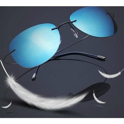 Viodream New fashion 100% B titanium Polaroid film the lightest glasses in the history only 10 G rimless unisex sunglasses
