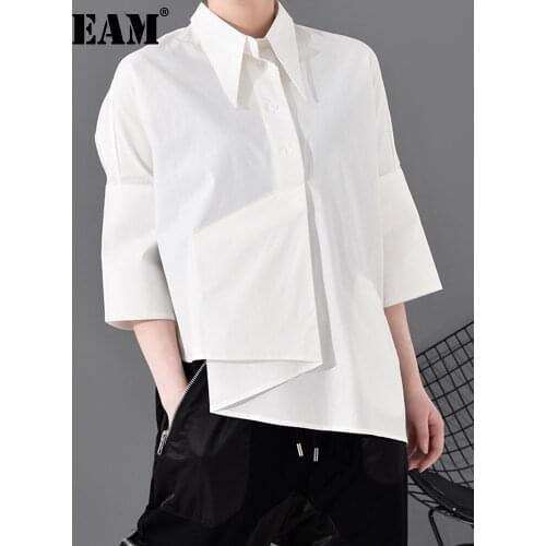[EAM] Women White Asymmetrical Big Size Blouse New Lapel Three-quarter Sleeve Loose Fit Shirt Fashion Spring Autumn 2021 1R59000