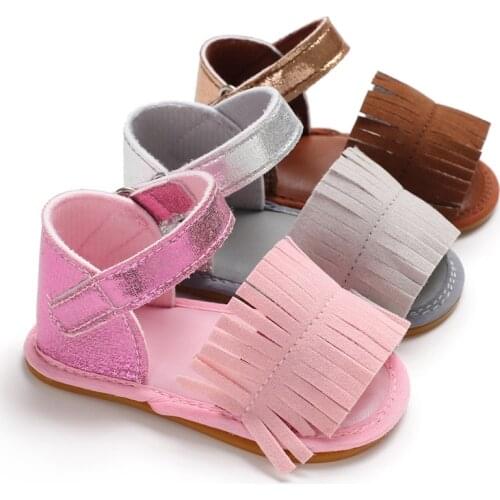Summer baby female baby soft bottom artificial PU first walker solid color tassel girl baby toddler