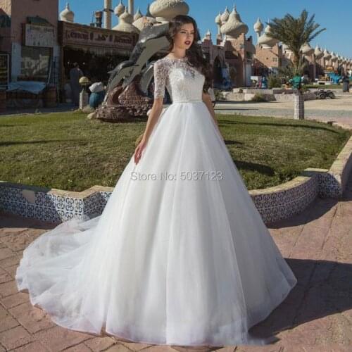 Tulle Ball Gown Wedding Dresses Half Sleeves O Neck Lace Appliques Button Illusion Court Train Vestido De Noiva Bridal Gowns