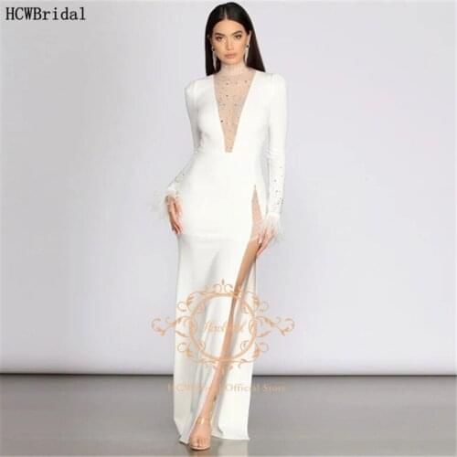 New 2021 White Dubai Evening Dress Long Sleeves Crystal Feather Sexy Prom Gown With Slit Mermaid Formal Dresses For Women