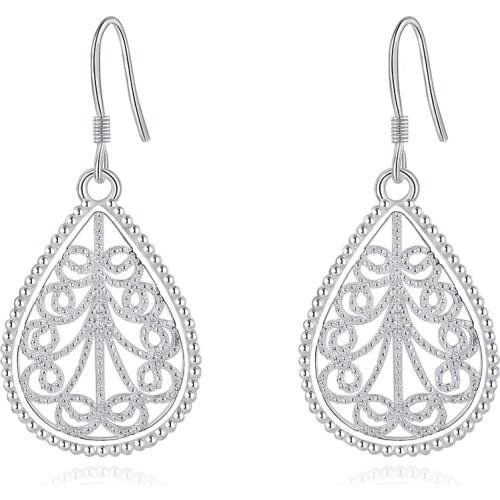 Free shipping silver beautiful simple and exquisite hollow retro through flower party earrings 2021 trend classic jewelry