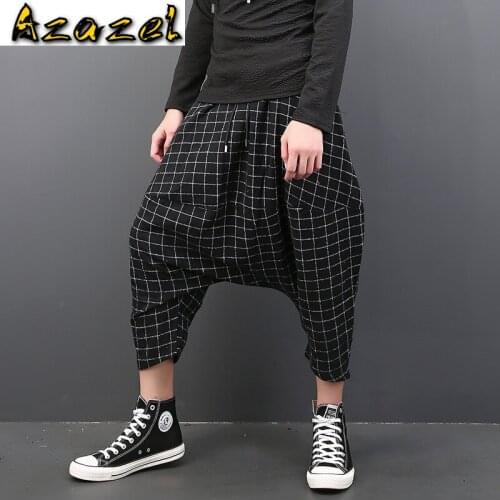 Hot 2020 Autumn And Winter New Woolen Mens Casual Pants Black Plaid Crotch Pants Men Fashion Loose Crotch Harem Pants Tide