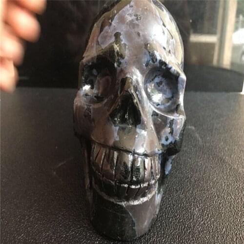 About 10 cm long, natural variegated stone carving skull variegated crystal skull for home decoration