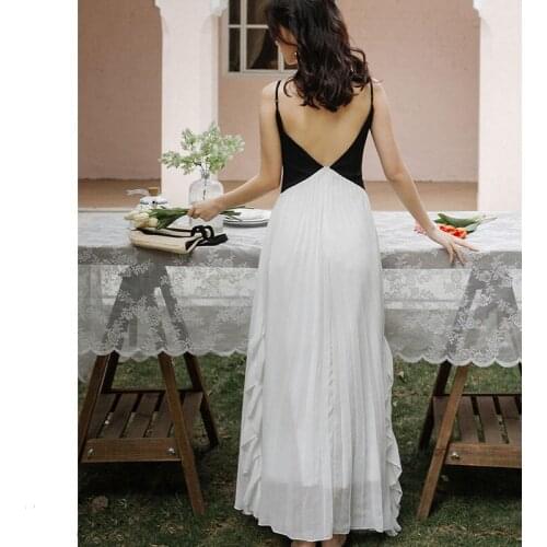 Sexy dress Female Seaside Vacation Pleated dress skirt Super Fairy High-end Halter Strap Stitching Pleated Beach Long skirt