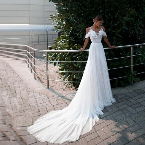 New Arrival V-neck Lace Flowers Beaded Tulle A-line Wedding Dress 2020 Sexy Cross Back Sweep Train Bridal Gowns For Bride