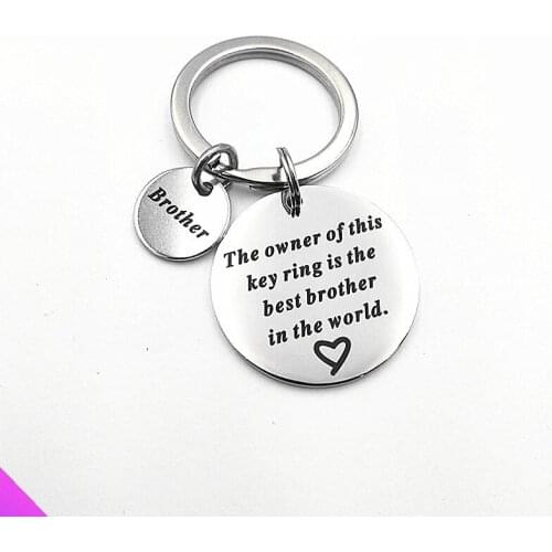 Keychain stainless steel disc pendants engraved with "the owner of this key ring is the best brother in the world"