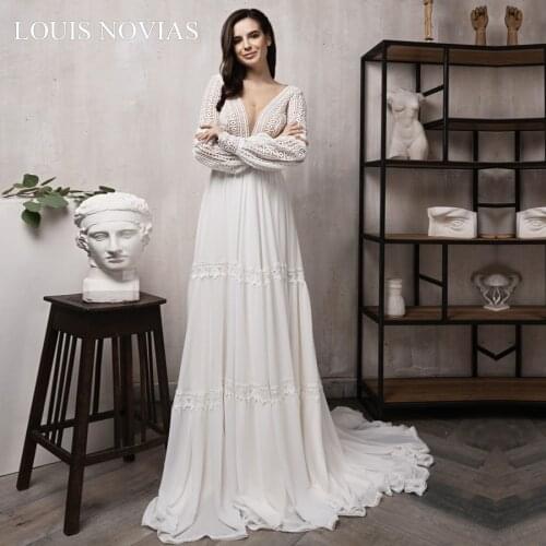 Louis Novias sexy deep V-neck wedding dress simple Empire cut open back long sleeve brush tail soft satin dress wedding dress