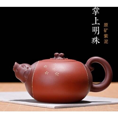 Yixing purple clay pot raw ore Purple mud red clay pearl on the palm