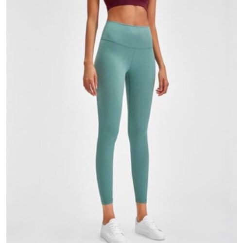 The latest soft nude sports fitness leggings women four-way stretching leggings yoga pants hip pants