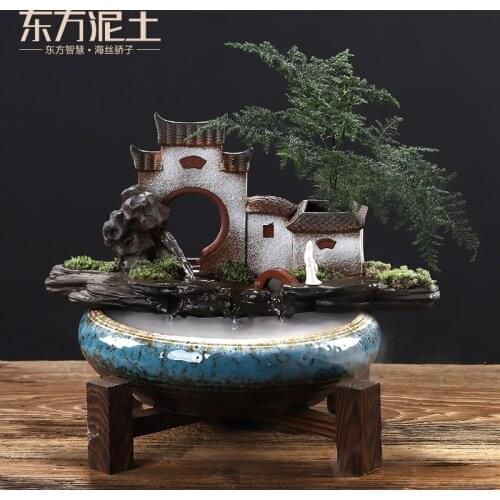 Clay ceramic Fengshui Zhaocai Liushui ornaments home living room indoor TV cabinet fish tank humidification ornaments