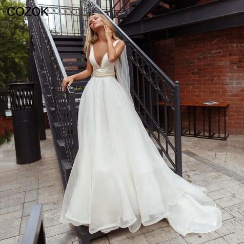 Sexy Backless Princess Wedding Dresses Tank V Neck Sleeveless Long Train Tulle Bridal Gowns Vestido De Noche