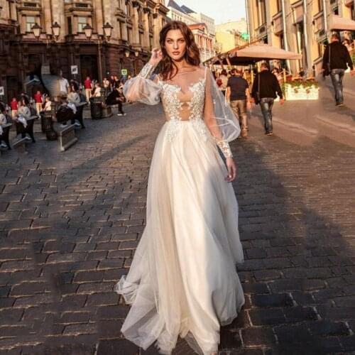 Transparent Long Puff Sleeve Wedding Dress Sexy See Through A-Line Appliques Tulle Floor Length Bride Grown robe de mariée