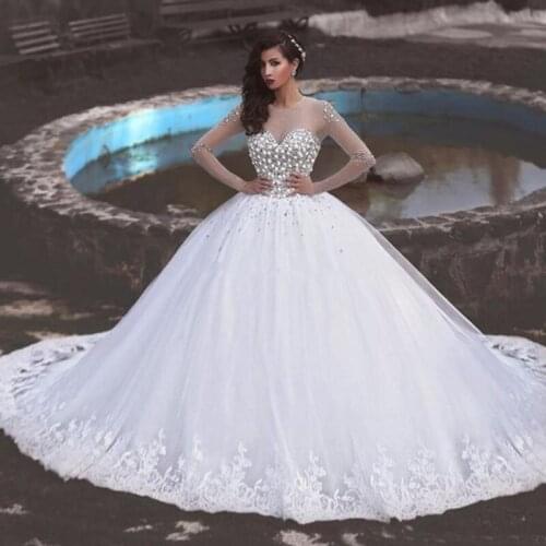 2020 Luxury Ball Gown Wedding Dresses O Neck Long Sleeves Crystal Beaded Tulle Appliques Saudi Arabic Wedding Gowns Bridal Dress