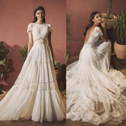 2020 Bohemian Wedding Dresses Scoop Neck Lace Appliques Chiffon Bridal Gowns Sexy Backless Sweep Train A-Line Wedding Dress