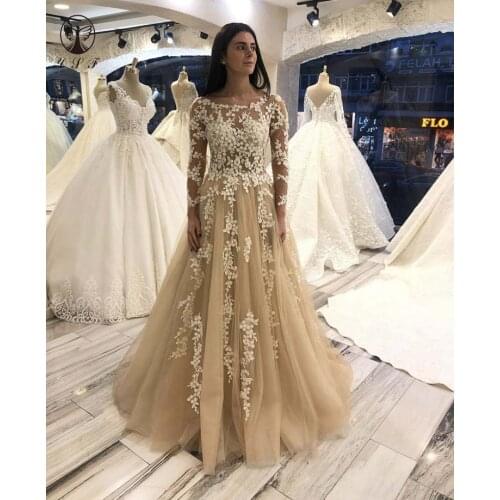 Design Prom Dresses O Neck Appliqued Lace Long Sleeve Sheer Bodice Floor Length Champagne Prom Dresses