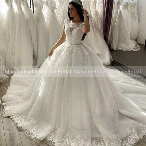 Luxury Glitter Ball Gown Wedding Dresses With Cap Sleeves New Design Beaded Appliques Princess Tulle Bridal Dress Robe De Mariee