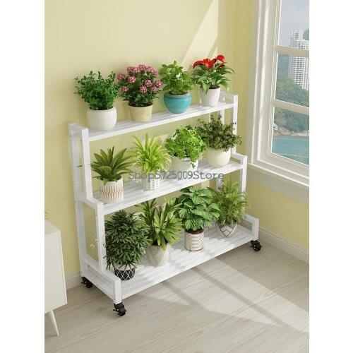 Ladder wrought iron flower stand balcony multi-layer flower stand living room floor type movable belt wheel against the wall cre