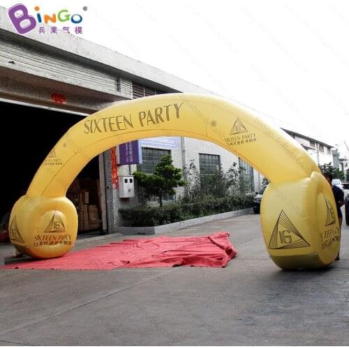 Customized 7x3.5 meters yellow color inflatable headphone arch promotional blow up headset archway toys