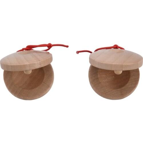 A pair of wooden flamenco musical instrument castanets of wood color percussion instrument