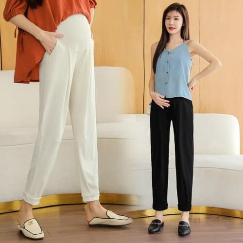 Pregnant womens belly lift pants spring and autumn to wear loose-fitting casual sports pants new trendy fashion harem pants