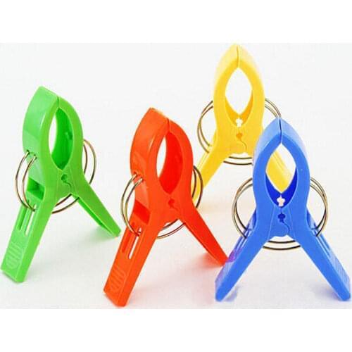 New 4pcs/set Clip lounger beach towel sun clothes sunbed peg pool cruiseship top 2019 Useful Clothes Pins