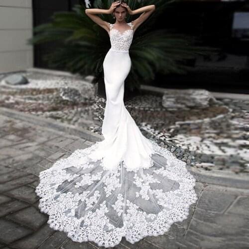 Mermaid Wedding Dress 2021 Lace Appliques Satin Bridal Dress Illusion Sweetheart Sleeveless Bridal Gowns Open Back Chapel Train